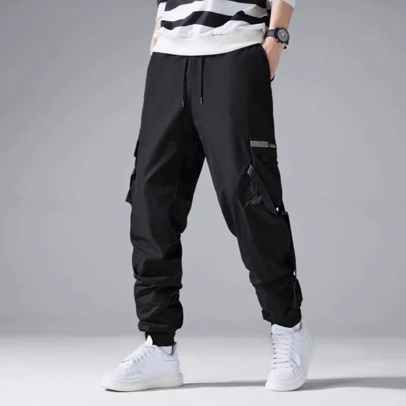 Herren Tech‑Cargo‑Jogger mit taktischen Klappentaschen, verstellbaren Nylonriemen und elastischem Knöchelsaum Echo Archiv